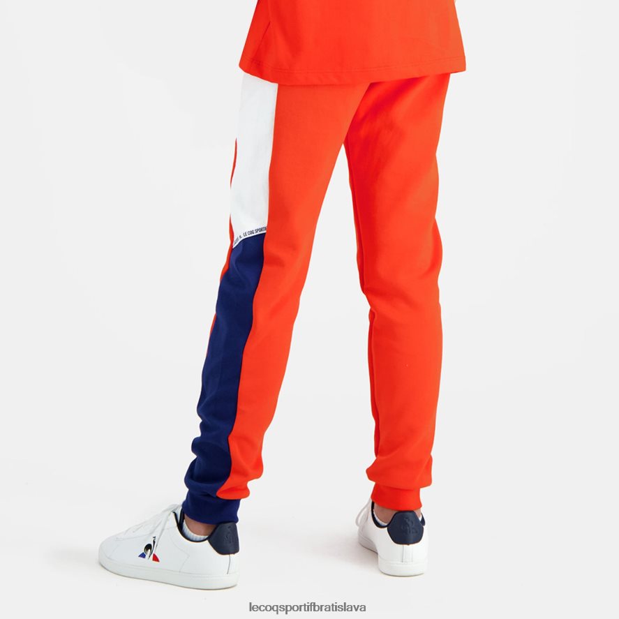 Le Coq Sportif oblečenie nohavice oranžové deti BF4DLN642