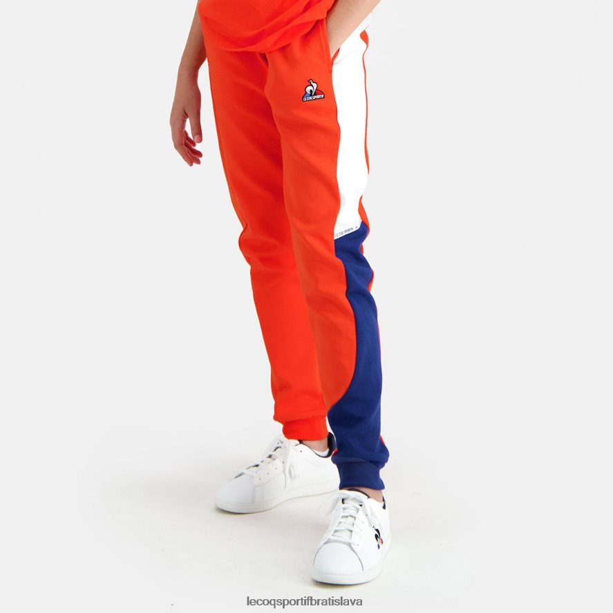 Le Coq Sportif oblečenie nohavice oranžové deti BF4DLN642